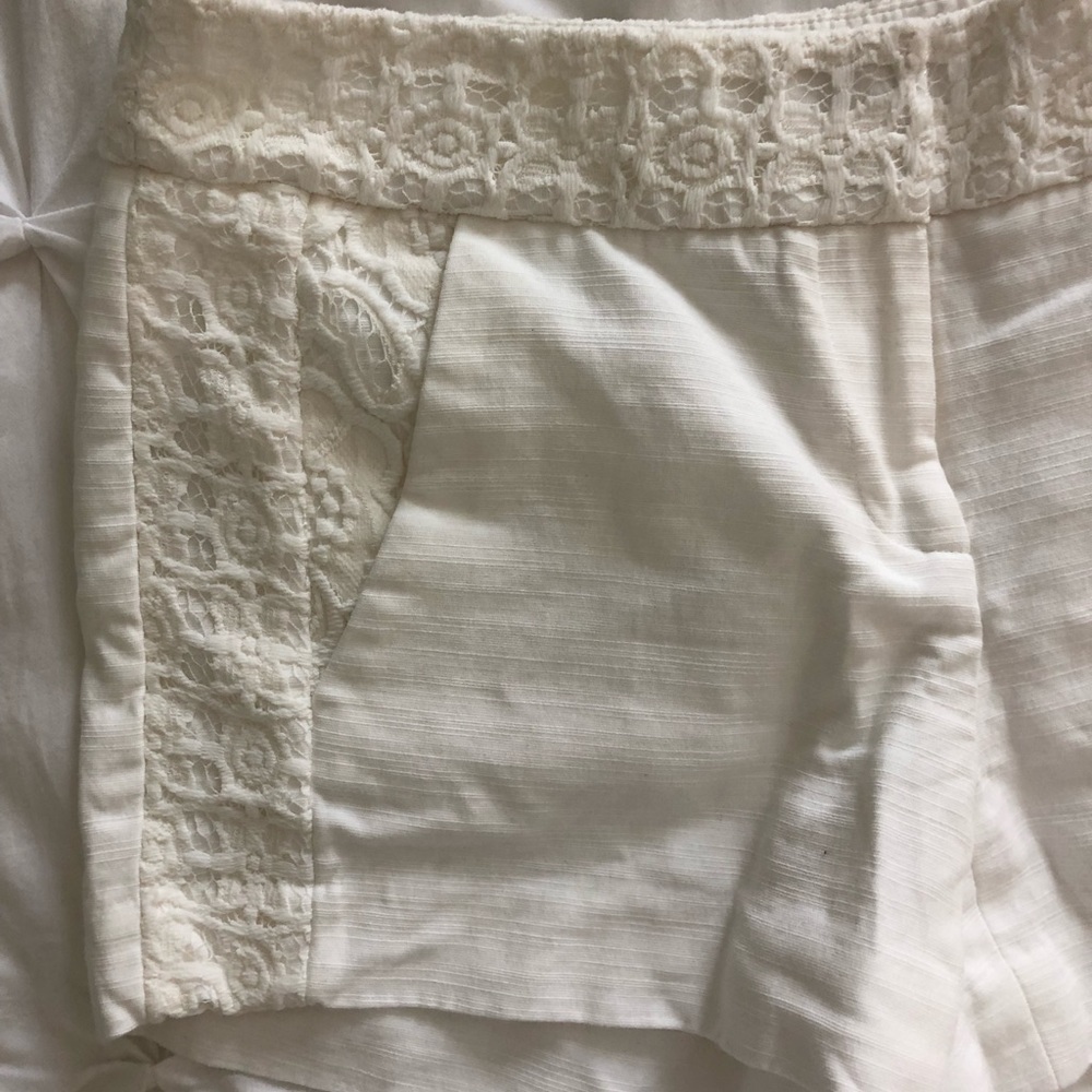 White LOFT shorts with lace detail.